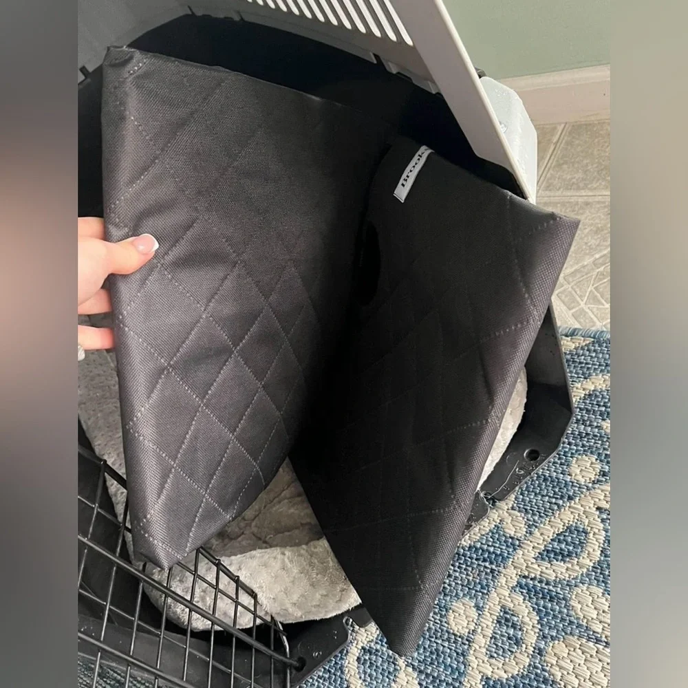 Dog crate, bedding in the crate, and trunk cover for dogs